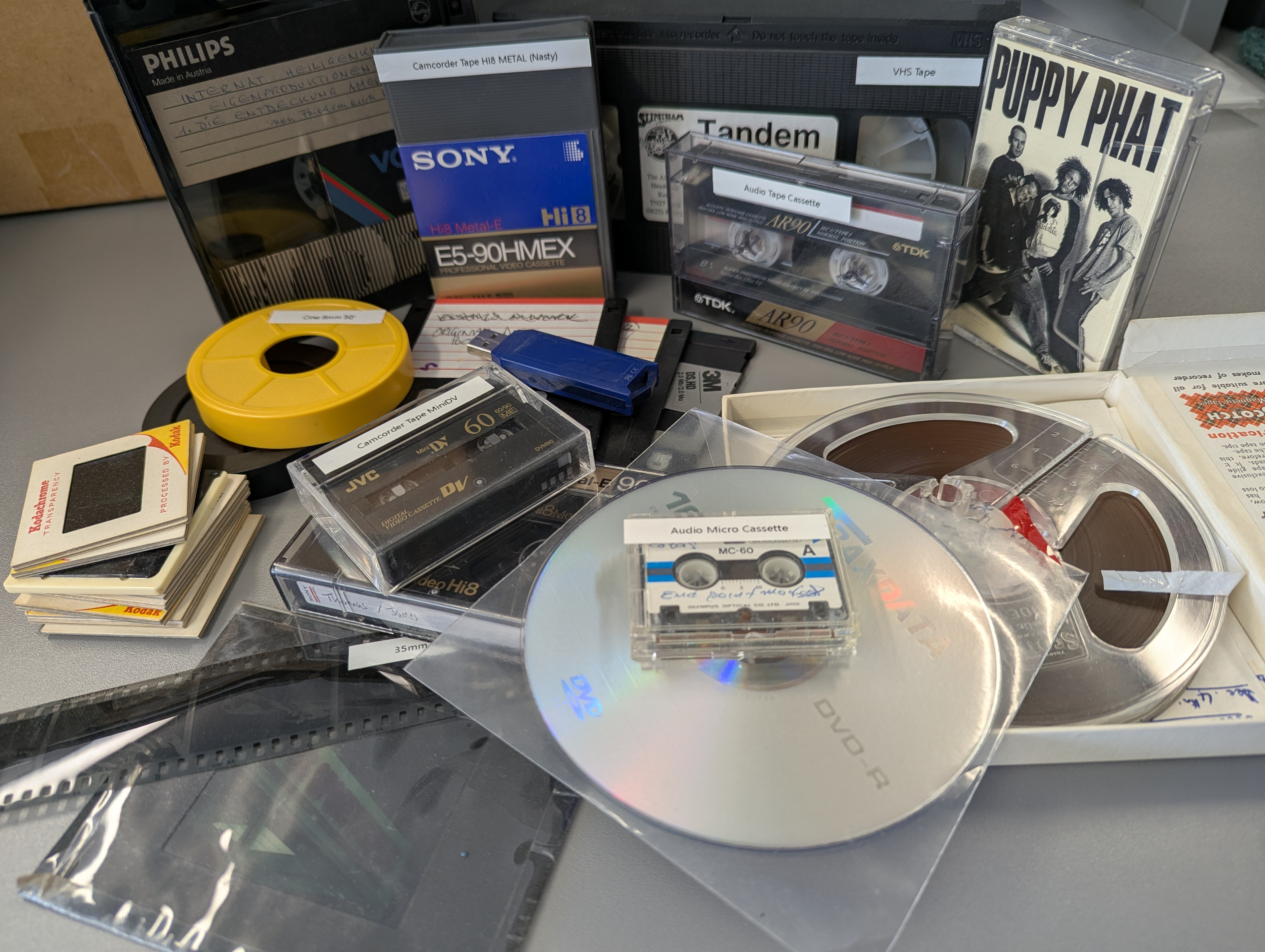 Larger family collection of tapes, photographs and discs